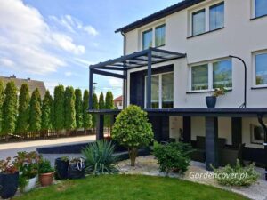 Zadaszenie tarasu Poznań aluminiowo szklane konstrukcja grafitowa