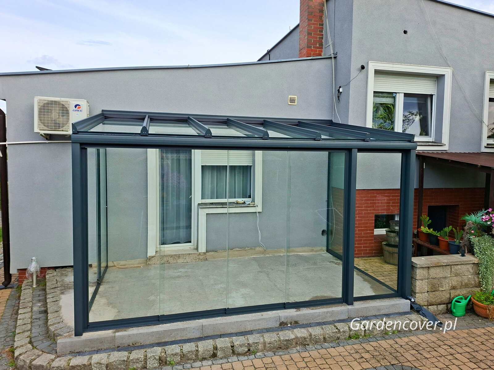 Zabudowa tarasu w Kaliszu ogród zimowy konstrukcja aluminiowa