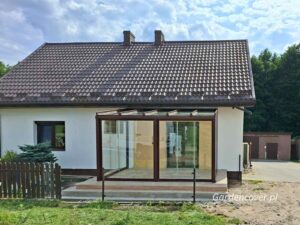 Zabudowa tarasu Łódź szyby przesuwne na froncie