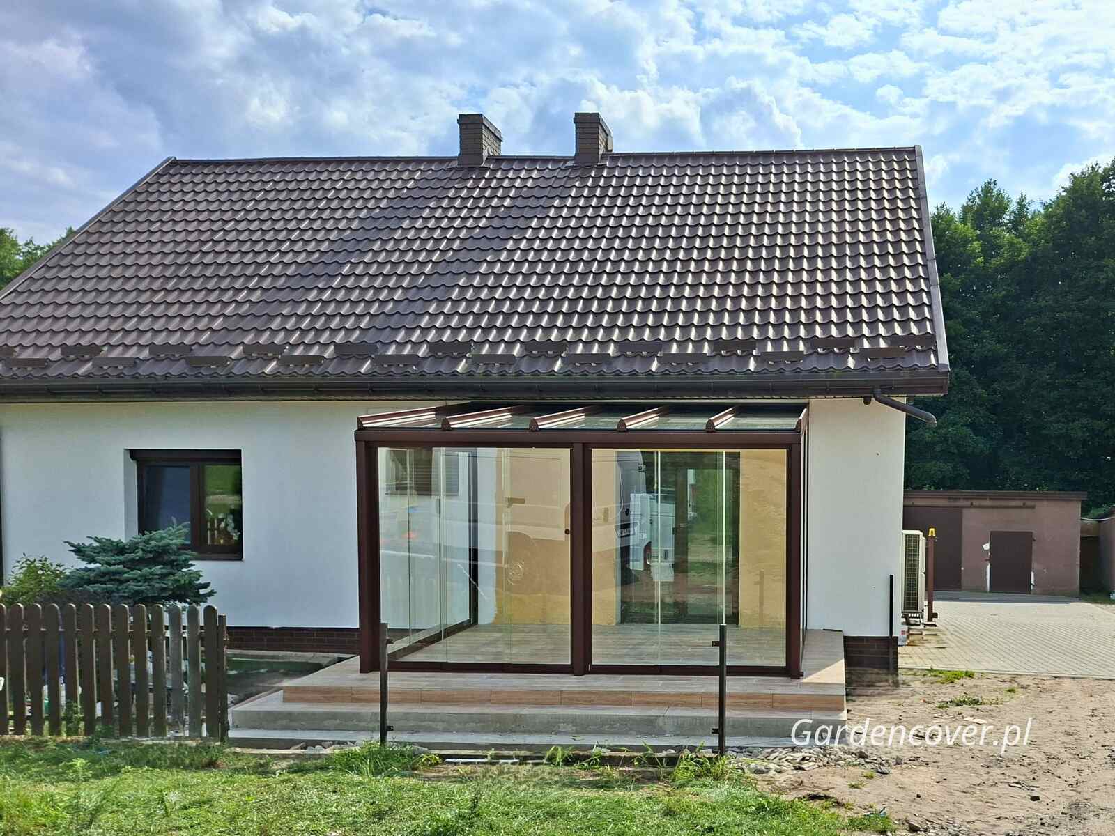 Zabudowa tarasu Łódź szyby przesuwne na froncie
