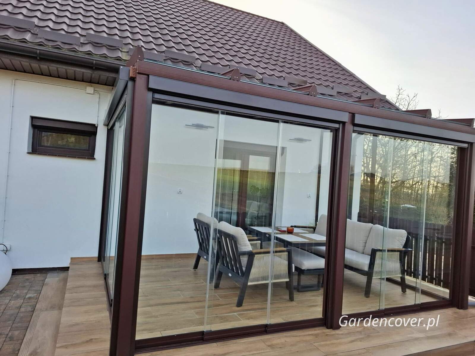 Zabudowa tarasu Łódź ogród zimowy na tarasie konstrukcja aluminiowa